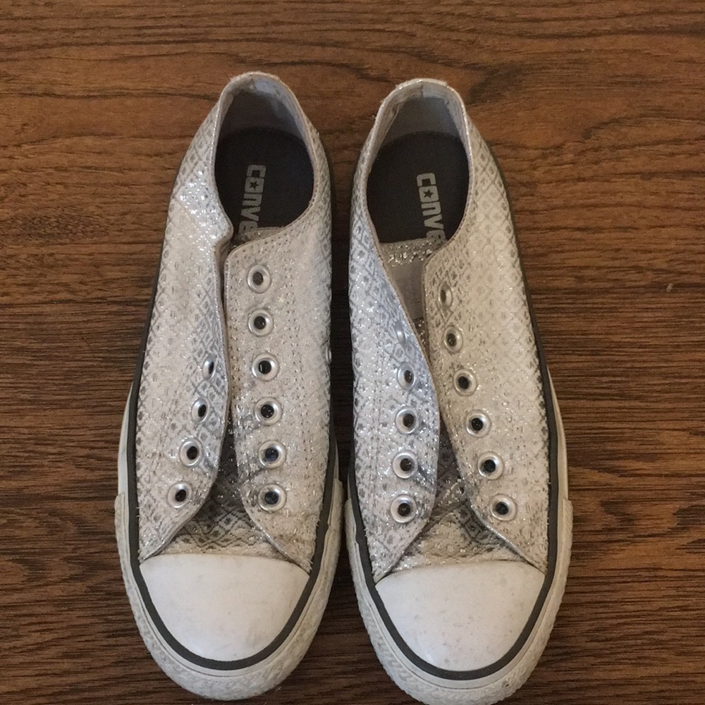 Silver and white low top converse